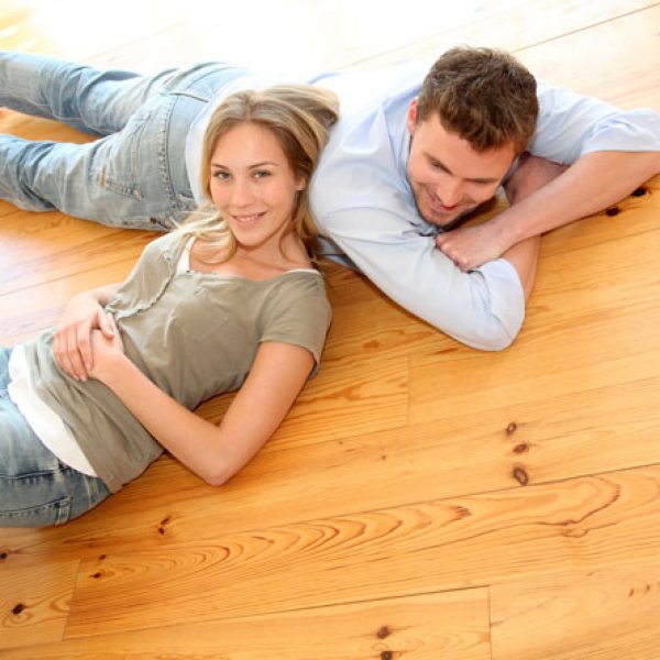 Couple at home relaxing on the floor
